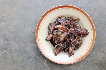 Squid Stew in Black Sauce, Tumis Cumi Hitam. Indonesian Food.