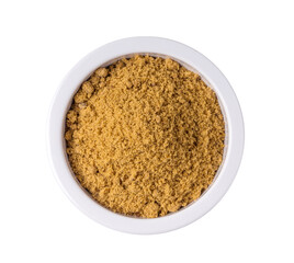 Brown cane sugar pile in white bowl isolated on transparent png