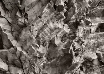 Foto op Plexiglas Intricate sculptural stone texture banner. Horizontal rock wall wallpaper.  © Emma Powell
