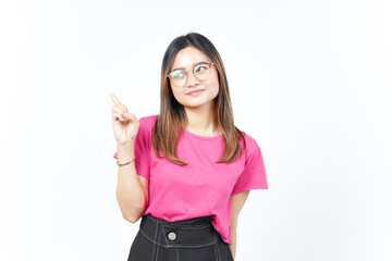 Obraz premium Showing Product and Pointing Side using forefinger Of Beautiful Asian Woman Isolated On White