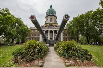 Fototapeta premium London UK June 12th 2015 : Naval cannons at the entrance to the Imperial War Museum in London
