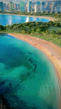 Aerial view of Magic Island beach enclosure at Ala Mona beach park, Honolulu Hawai'i