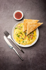 Bread Masala Omelette or Omlette with hot tea Indian style