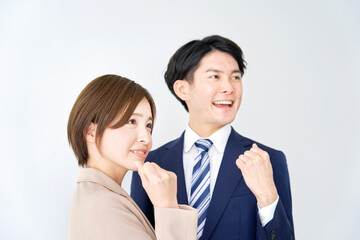 ガッツポーズするビジネスウーマンとビジネスマン　白背景