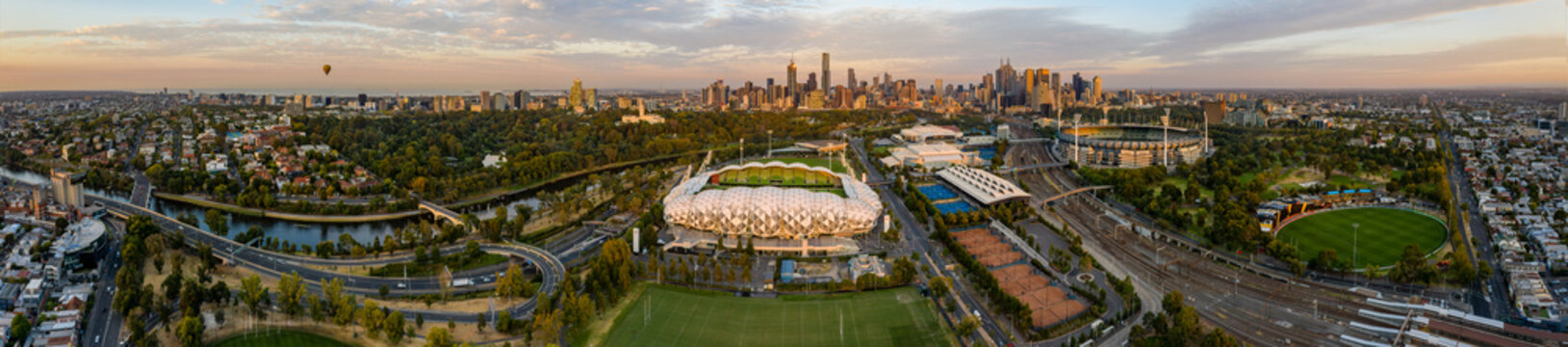 Melbourne Australia May 15th 2020 : Melbourne Australia March 9th 2019 : Aerial panoramic dawn view of the MCG and AAMI stadium, with the CBD in the background