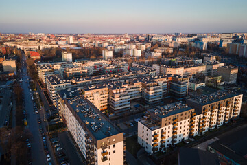 Fototapeta na wymiar Modern residential complex in Wroclaw city, Poland. Aerial view of district with modern residence buildings, courtyards and parked cars.