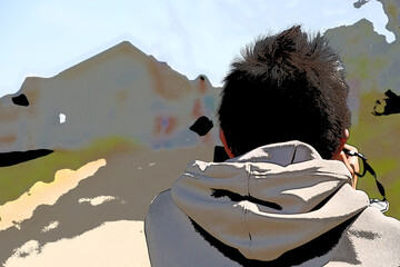 帰り道どこかを眺めている少年