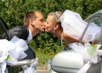 Married couple kissing