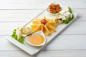 Assortment of cheese on a white plate