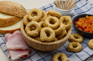 Taralli alla pugliese with extra virgin olive oil. Traditional Italian snack Taralli