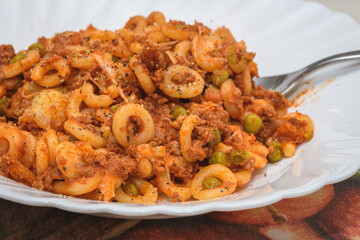 Italian Anelletti Baked Pasta With Ragu Sauce And Peas
