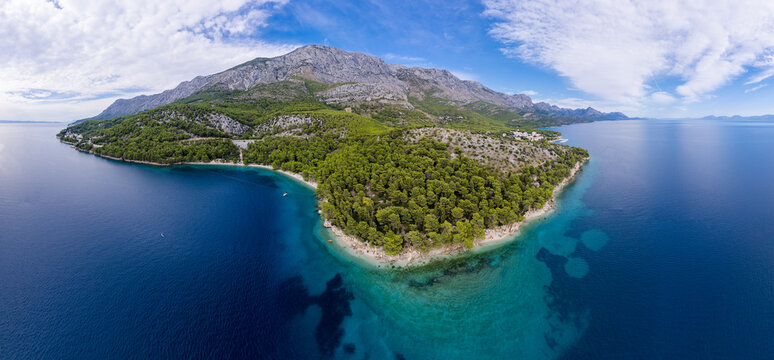 Duba plaza nearby Igrane village on Makarska riviera and Biokovo mountain aerial view, Dalmatia region of Croatia