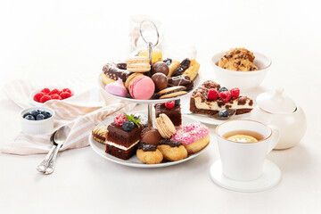Afternoon tea stand with sweet treats.