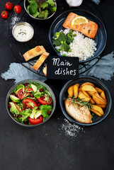 Table of various healthy food dishes. Healthy food assortment. Dieting concept.