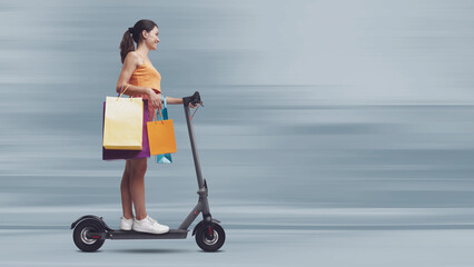 Woman going on a shopping spree and riding a scooter