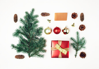 Christmas composition. Christmas gifts, pine branches, toys gift box, credit card on white background. Flat lay, top view.