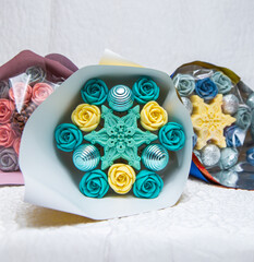 Three beautiful wedding gift bouquets with chocolate flowers