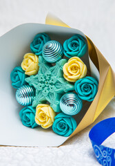 beautiful gift bouquets for home day made of chocolate yellow and blue color close up indoors
