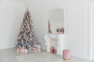 New year tree. Classic christmas New Year decorated room. Christmas tree with pink decorations. Christmas eve at home 