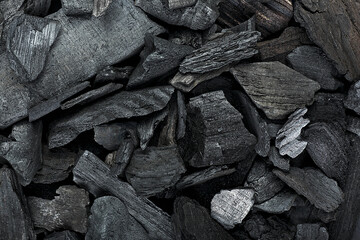 Natuurlijke zwarte houtskooltextuur als achtergrond, bovenaanzicht.