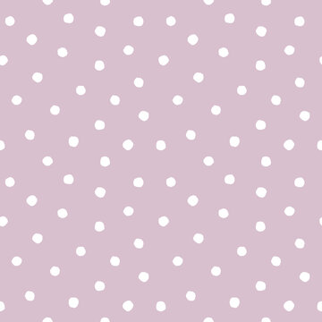 Purple rough polka dot on lilac background. Hand drawn seamless pattern. For wallpaper, textile, gift wrap, interior decoration, stationery and surface design