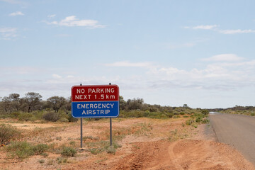 Sign in remote outback Queensland highway used as an emergency landing airstrip.