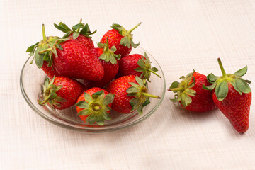 Fresh and Juicy beautiful organic strawberries on wooden background. Top view point.