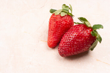 Fresh and Juicy beautiful organic strawberries on wooden background. Top view point.