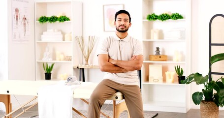 Portrait, man and massage therapist arms crossed in spa ready for health and skincare treatment. Wellness, luxury and male masseuse from Singapore with pride for physical therapy job or career.