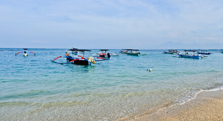 Obraz premium traditional wooden fishing boat on Kuta beach, Bali. Indonesia