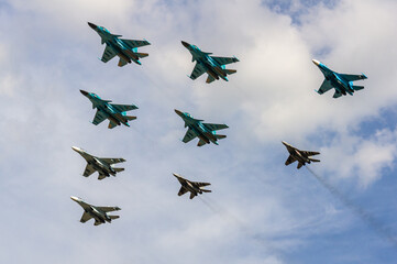 Formation flight of front-line supersonic fighter-bombers of fourth generation Su-34 (Fullback) and Su-35 (NATO - Flanker-E). 100 years of the Russian Air Force. Zhukovsky, Russia, August 10, 2012