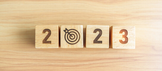 2023 block with dartboard icon. Goal, Target, Resolution, strategy, plan, Action, mission,...