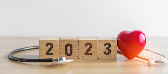 2023 Happy New Year for health care, Insurance, Wellness and medical concept. Stethoscope of doctor...