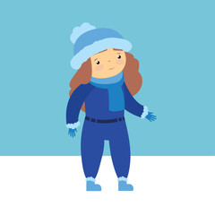 girl in blue overalls on a winter walk