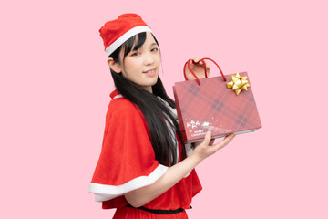 プレゼントを持ったサンタガール