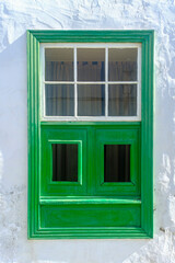 Rustic green wooden window on white background