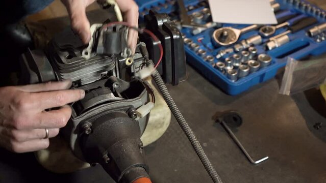 replace the ignition coil,replacing an old broken ignition coil on a brushcutter
