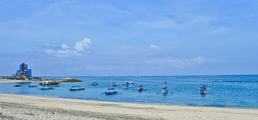 traditional wooden fishing boat on Kuta beach, Bali. Indonesia