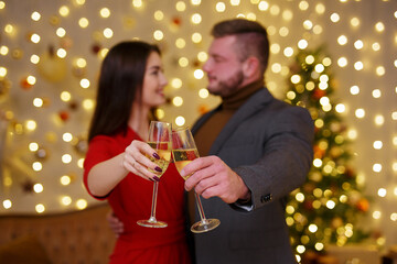 Close up of hands with champagne glass