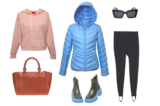 Collage woman clothes. Set of luxurious and stylish elegant blue down jacket, chelsea boots, hooded sweatshirt, handbag, female black pants and accessories isolated on a white background.
