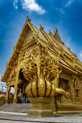 Close-up golden statue in Thai temple 