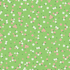 Vintage seamless floral pattern. A game-style background of small pastel-colored flowers. Small white and pink flowers scattered on a green background. Stock vector for printing on surfaces .