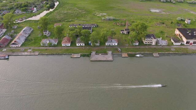 Aerial view of Chilia old town and the port on the Kilya waterway on Danube river. Danube delta Romania. The port of Chilia. Maritime navigation arm and border point. Chilia Veche, Romania and Ukraine
