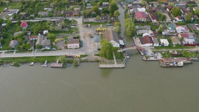 Aerial view of Chilia old town and the port on the Kilya waterway on Danube river. Danube delta Romania. The port of Chilia. Maritime navigation arm and border point. Chilia Veche, Romania and Ukraine