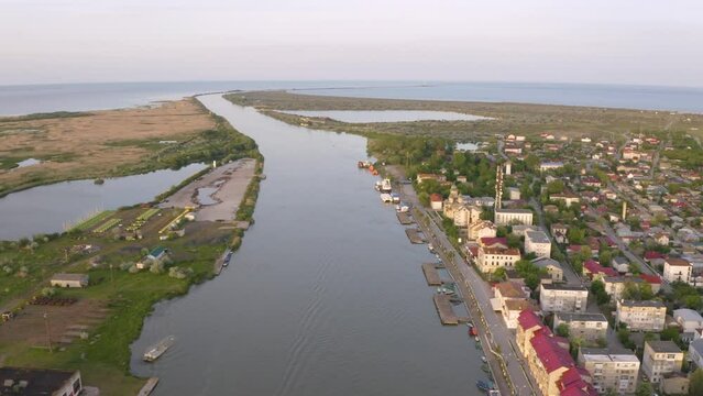 Aerial view of Chilia old town and the port on the Kilya waterway on Danube river. Danube delta Romania. The port of Chilia. Maritime navigation arm and border point. Chilia Veche, Romania and Ukraine