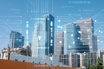 Panorama cityscape of Los Angeles downtown at day time, California, USA. Skyscrapers of LA city. Glowing Padlock hologram. The concept of cyber security to protect companies confidential information
