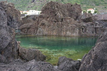 The cliff, reef and sea