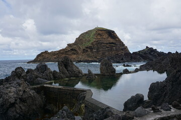 The cliff, reef and sea