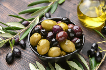 Mixed green olives and black olives with olive oil, healthy eating antioxidants