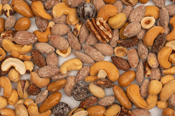 A group of almonds, pistachios, walnuts, macadamia, cashews.